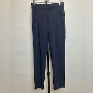 Athleta women’s “Brooklyn Ankle Pant”, color navy, size 4.